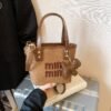 Trend Miu Handbag Embroidery Texture Bucket Bag Fashion Niche Design Commuter Casual Messenger Bag