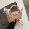 New Niche Design Dumpling Bag Splicing Dragon Bags Xiangchao Versatile Handbag Women’S Contrasting Shoulder Bag